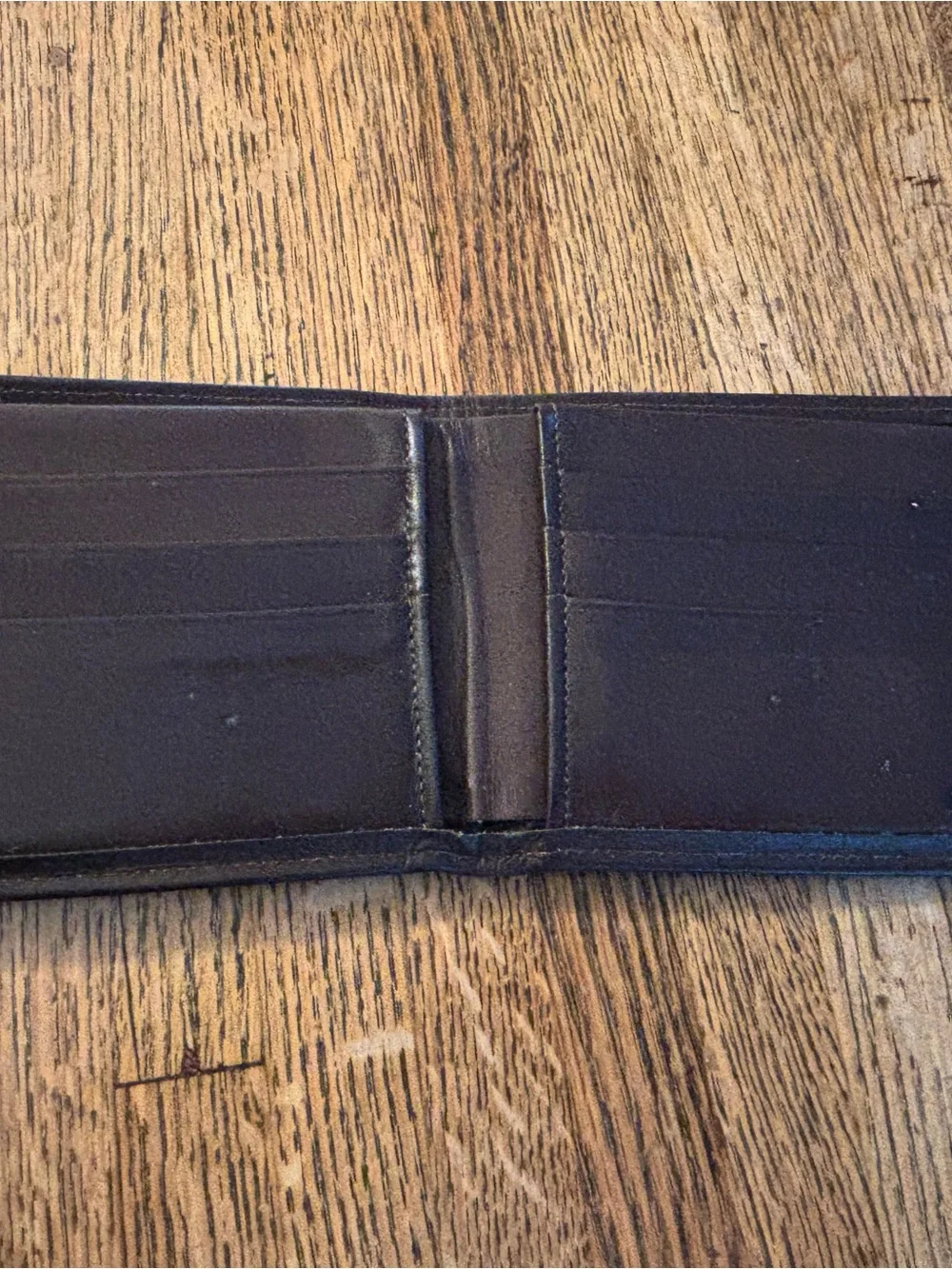Four Vintage Black and Brown Leather Men's Wallets